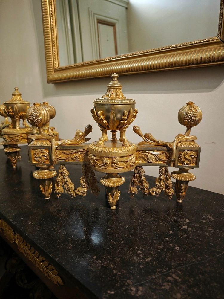 Pair of gilt bronze Chenets with Antique style Pots in the Louis XVI style 19th century