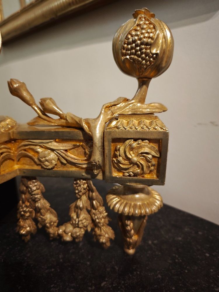 Pair of gilt bronze Chenets with Antique style Pots in the Louis XVI style 19th century