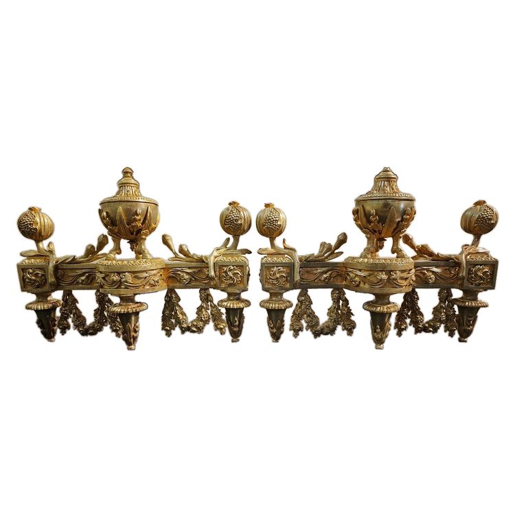 Pair of gilt bronze Chenets with Antique style Pots in the Louis XVI style 19th century