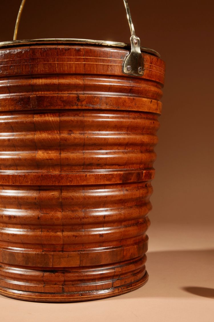 Highly decorative and original peat tea bucket in walnut, jardinière style.