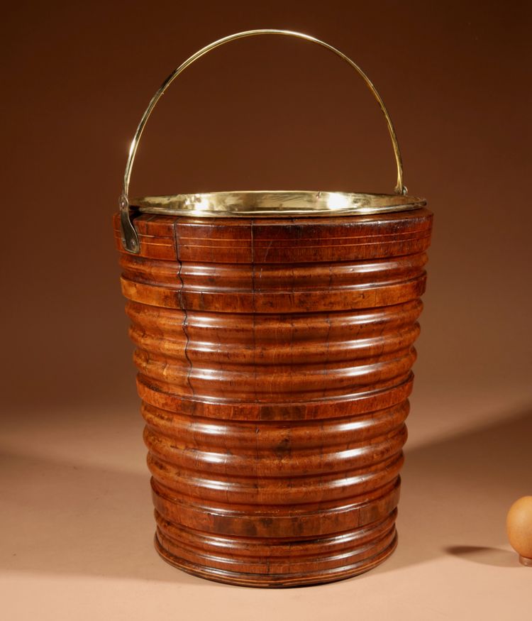 Highly decorative and original peat tea bucket in walnut, jardinière style.