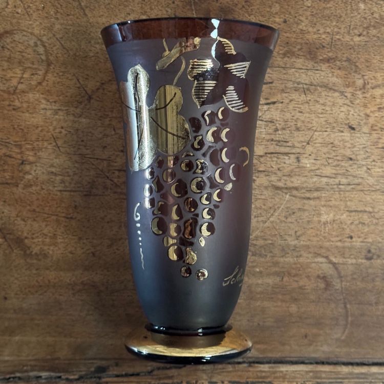 Frosted Shneider vase with pink background and gold vine leaves