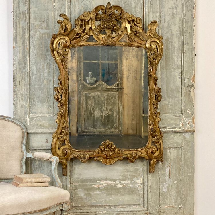 Large Provençal mirror in gilded wood 18th century