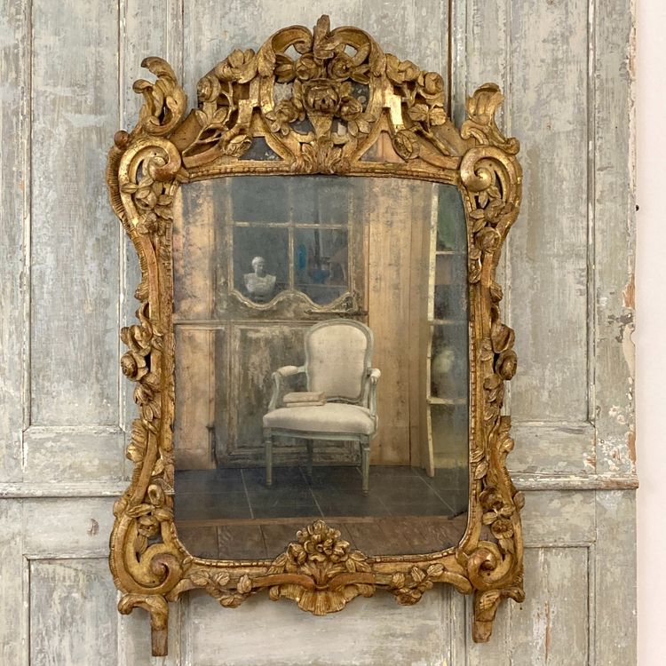 Large Provençal mirror in gilded wood 18th century