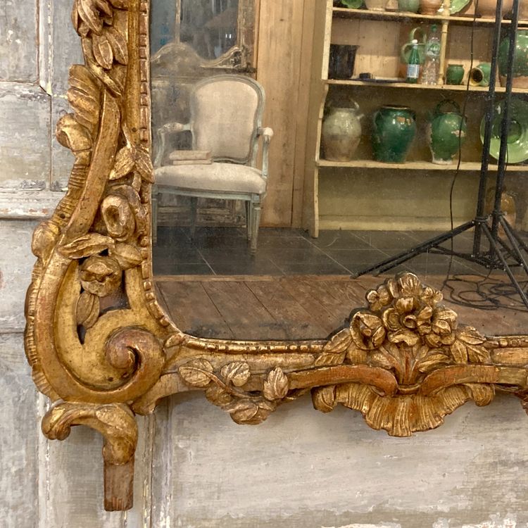 Large Provençal mirror in gilded wood 18th century