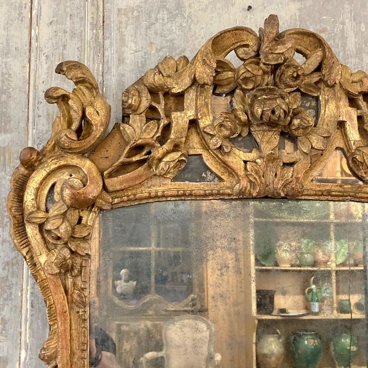 Large Provençal mirror in gilded wood 18th century