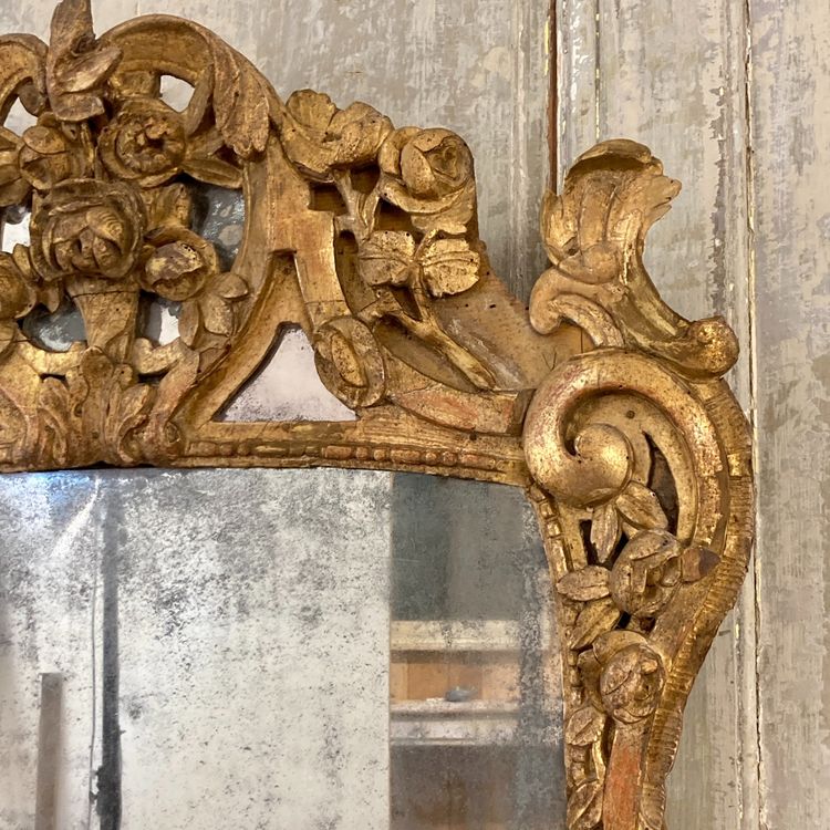 Large Provençal mirror in gilded wood 18th century