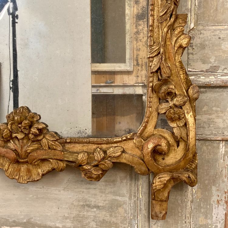 Large Provençal mirror in gilded wood 18th century