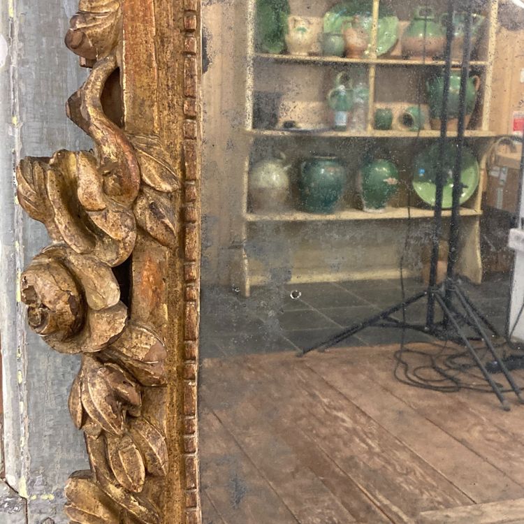 Large Provençal mirror in gilded wood 18th century