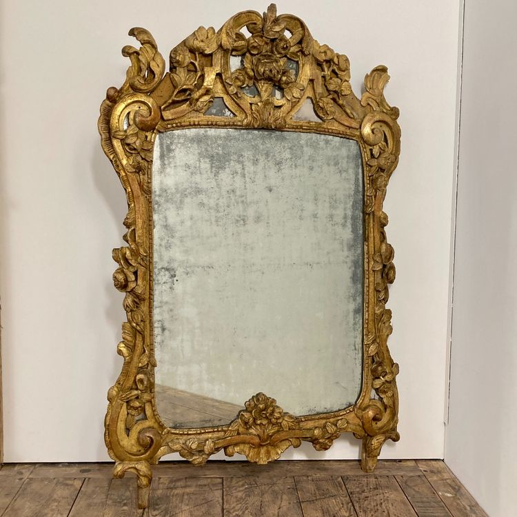 Large Provençal mirror in gilded wood 18th century