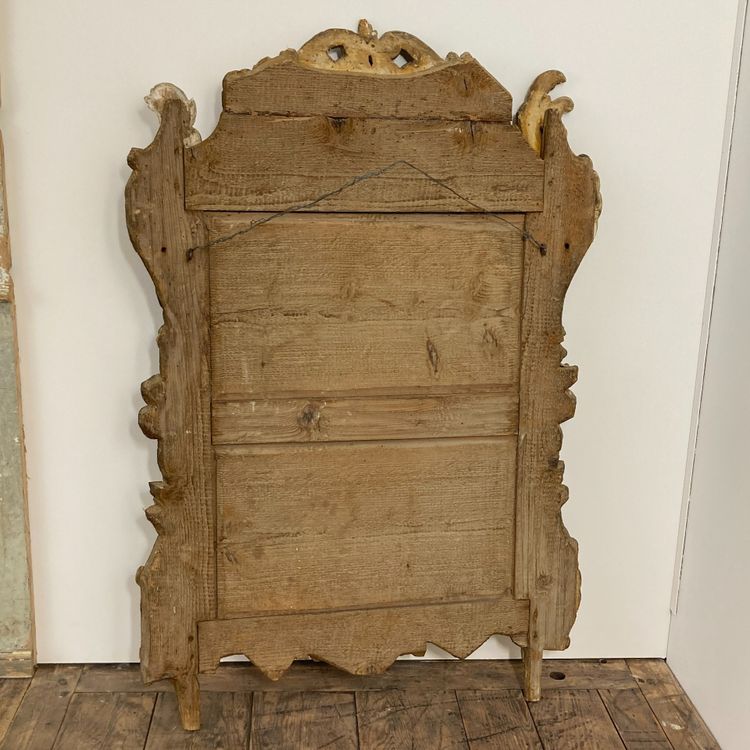 Large Provençal mirror in gilded wood 18th century