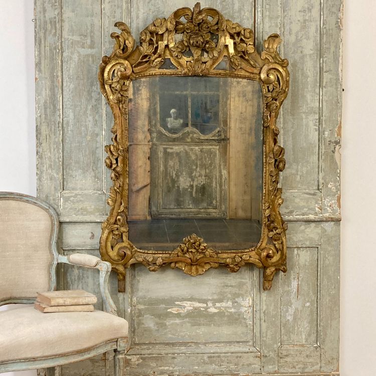 Large Provençal mirror in gilded wood 18th century