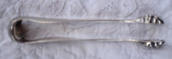 Ice cube/sugar tongs in solid silver, guilloche pattern, silversmith Alphonse DEBAIN 19th century