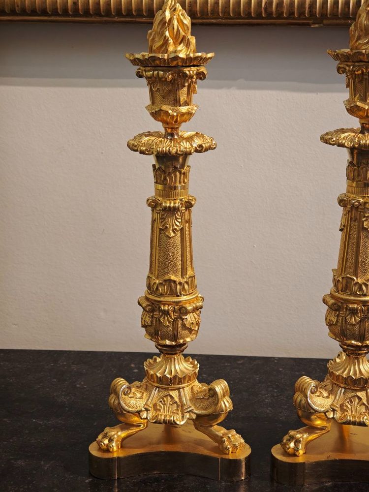 Pair of Restauration-period ormolu torches, circa 1830.