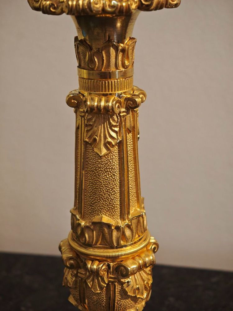 Pair of Restauration-period ormolu torches, circa 1830.