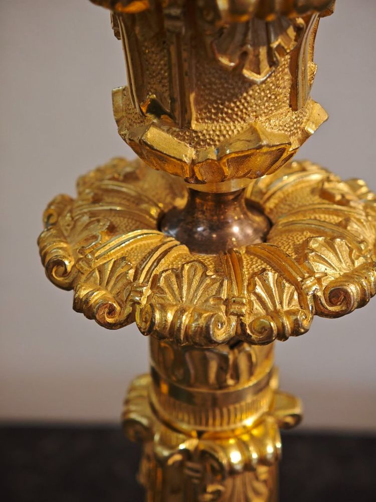 Pair of Restauration-period ormolu torches, circa 1830.