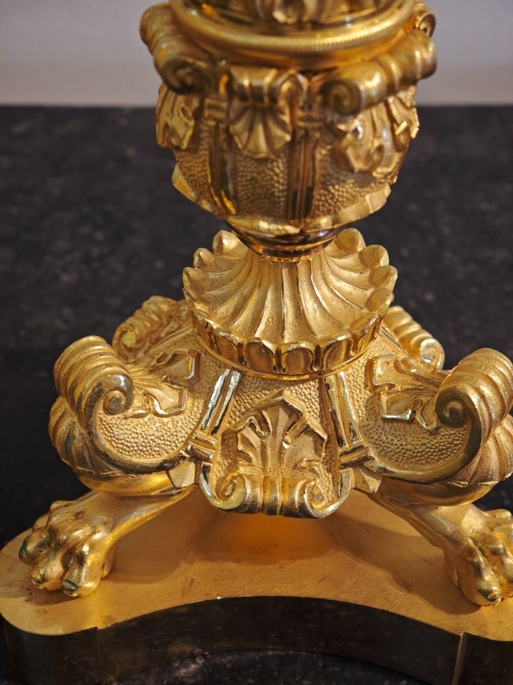 Pair of Restauration-period ormolu torches, circa 1830.