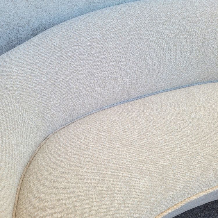 In the style of J Royère, polar bear sofa
