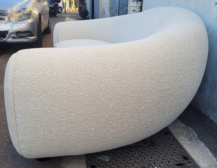 In the style of J Royère, polar bear sofa
