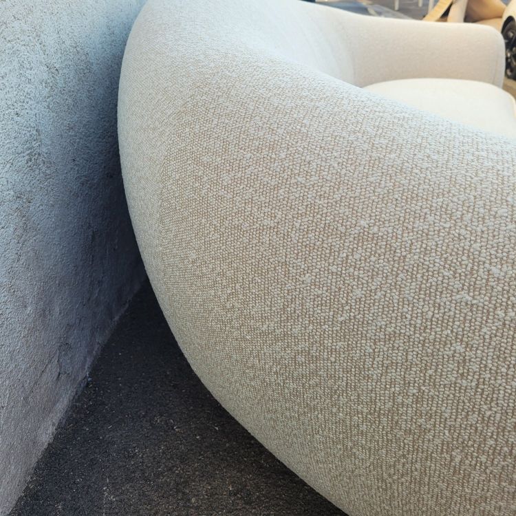 In the style of J Royère, polar bear sofa