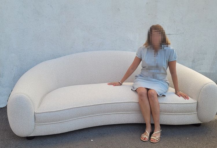 In the style of J Royère, polar bear sofa