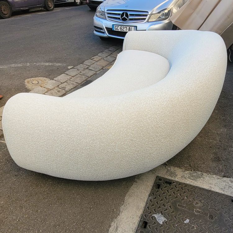 In the style of J Royère, polar bear sofa