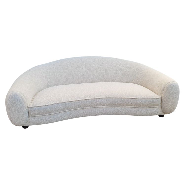 In the style of J Royère, polar bear sofa