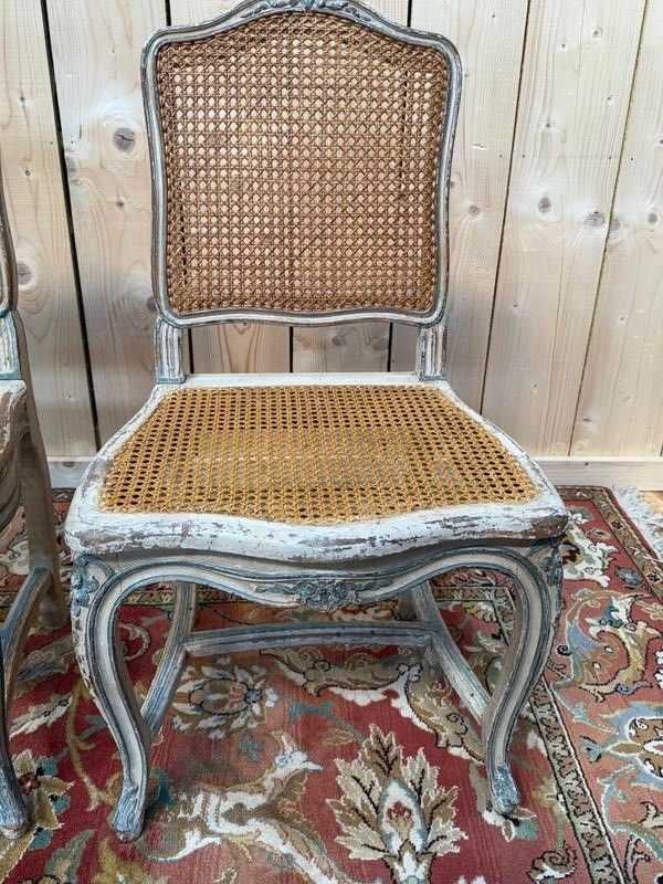 Suite de 4 chaises cannées de style Louis XV rechampi 