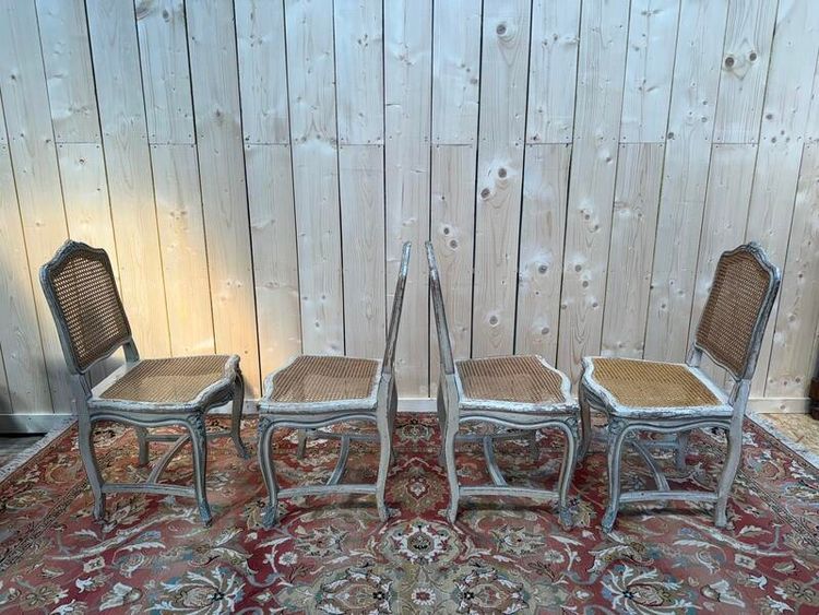 Suite de 4 chaises cannées de style Louis XV rechampi 