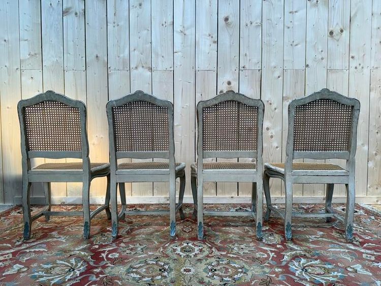 Suite de 4 chaises cannées de style Louis XV rechampi 