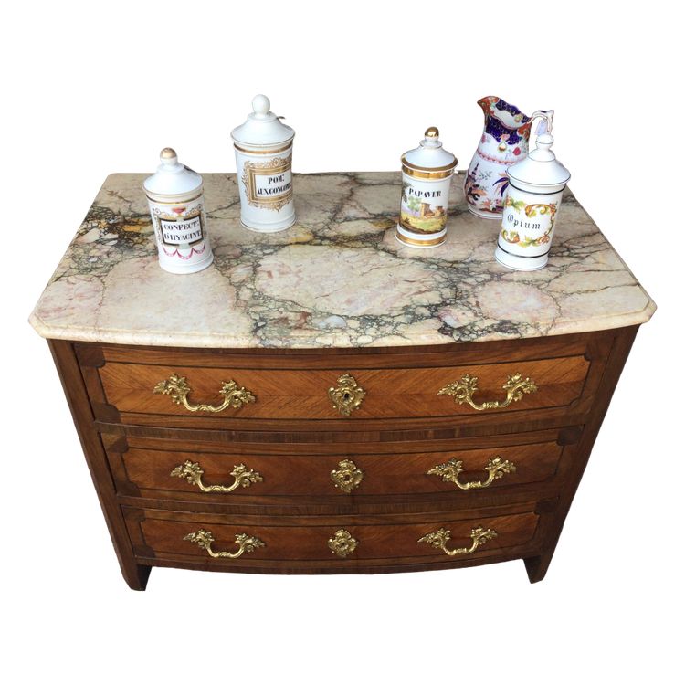 Une commode de style Louis XIV- Régence en marqueterie