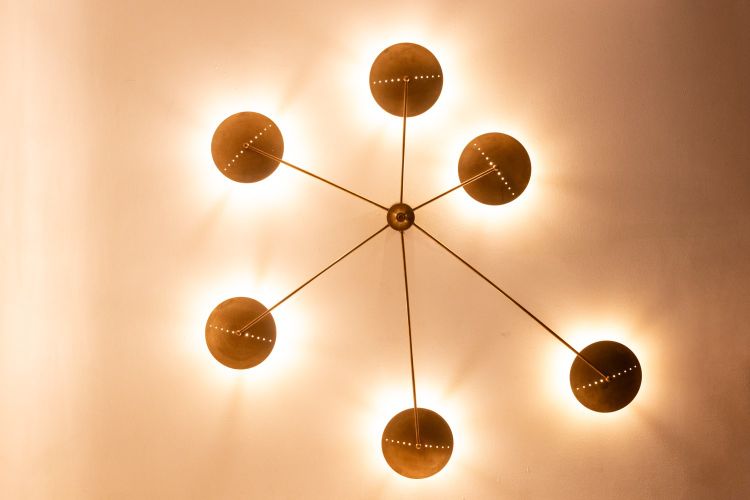 Contemporary 6-light wall sconce in patinated brass. LS6455808Z