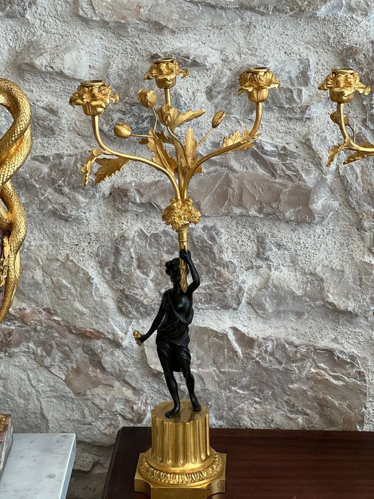 Paire de candélabres en bronze patiné et bronze doré, début du XIXème siècle.