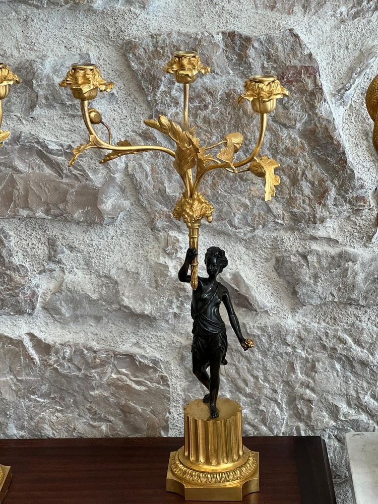 Paire de candélabres en bronze patiné et bronze doré, début du XIXème siècle.