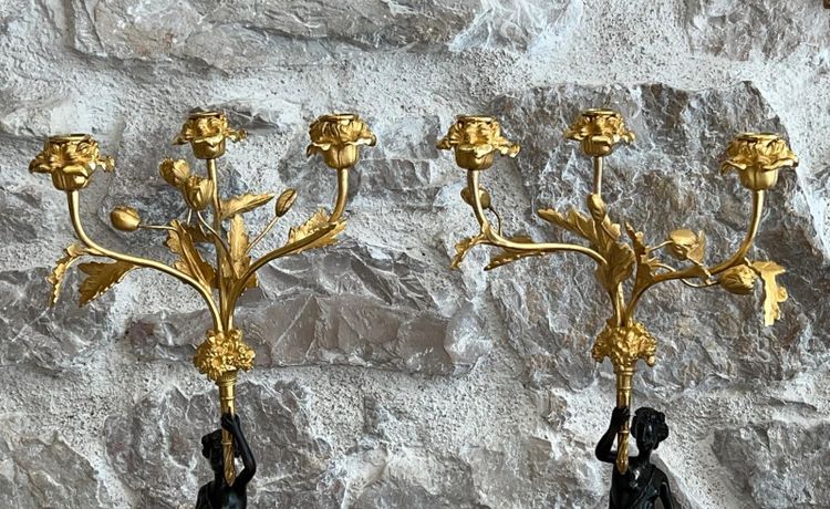 Paire de candélabres en bronze patiné et bronze doré, début du XIXème siècle.
