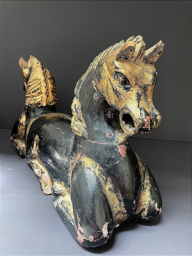 Italy, mid-20th century, pair of ornamental horses in black and gold lacquer.