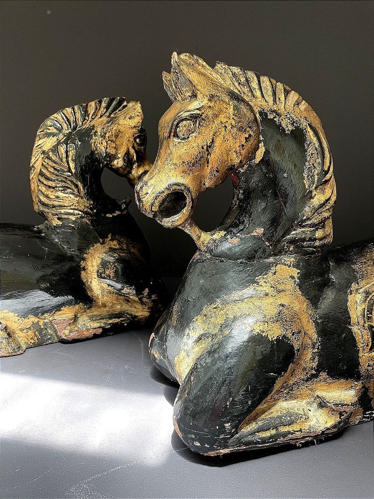 Italy, mid-20th century, pair of ornamental horses in black and gold lacquer.