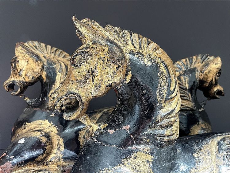 Italy, mid-20th century, pair of ornamental horses in black and gold lacquer.