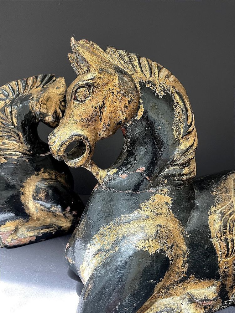 Italy, mid-20th century, pair of ornamental horses in black and gold lacquer.