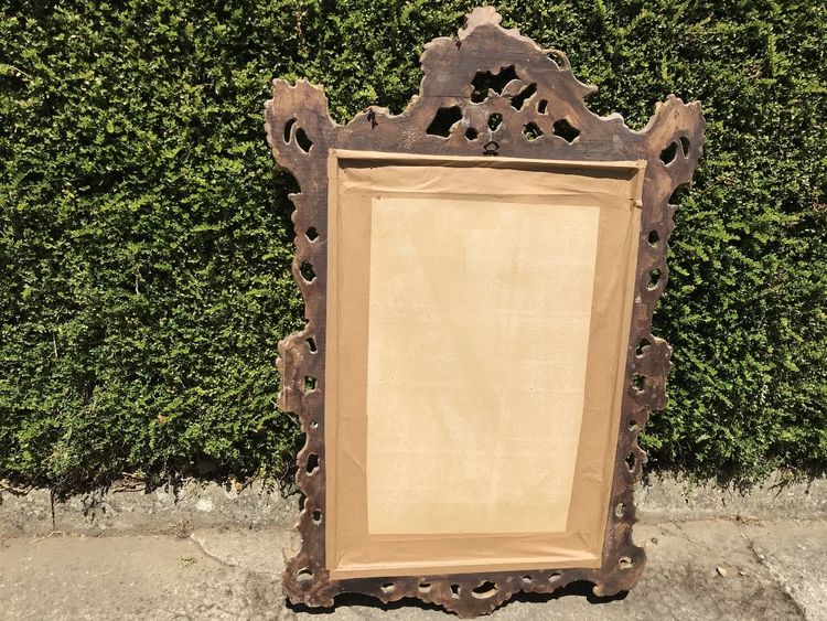 Antique Louis XV style gilded wood mirror from the 20th century