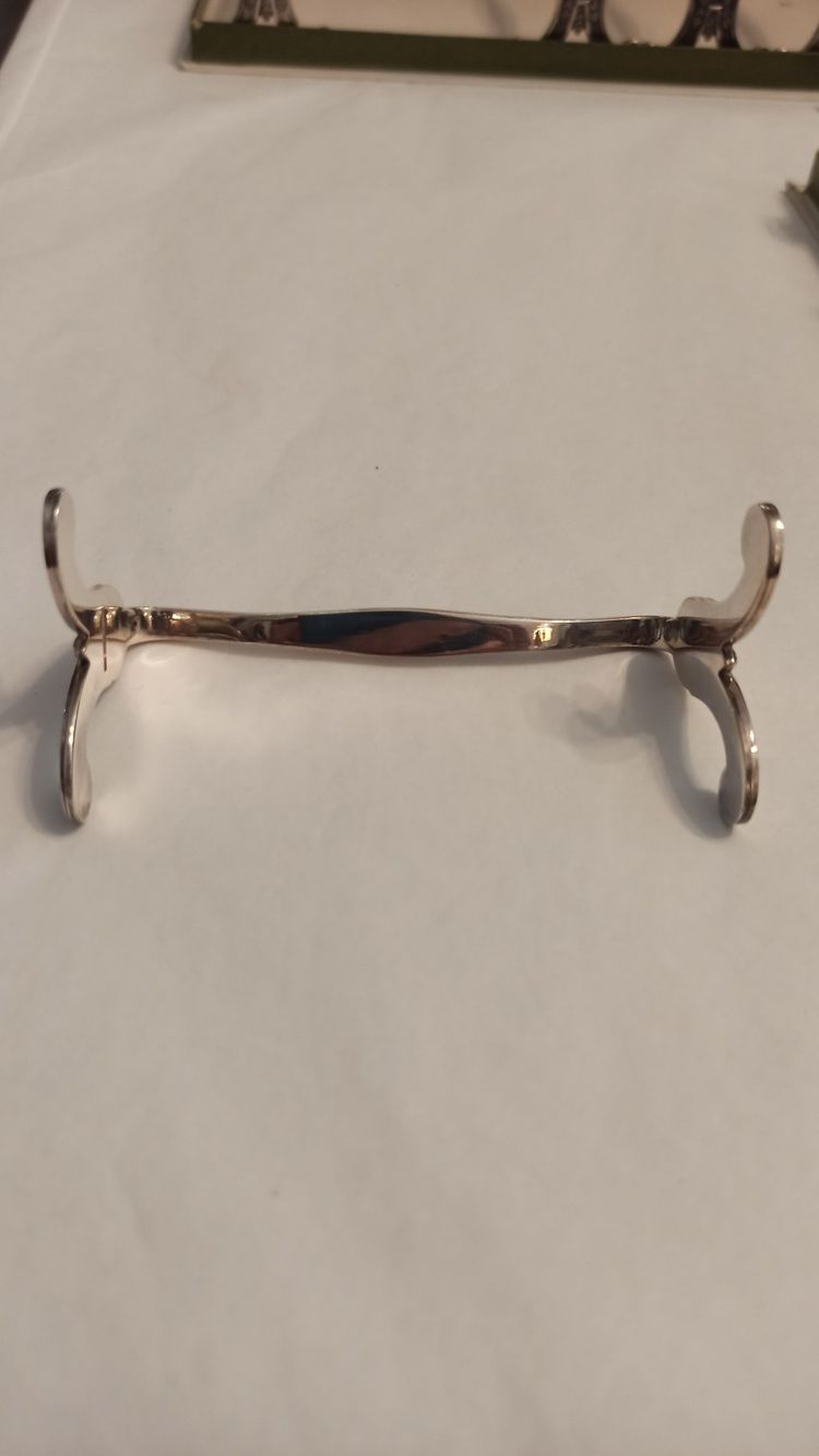 12 Christofle knife rests