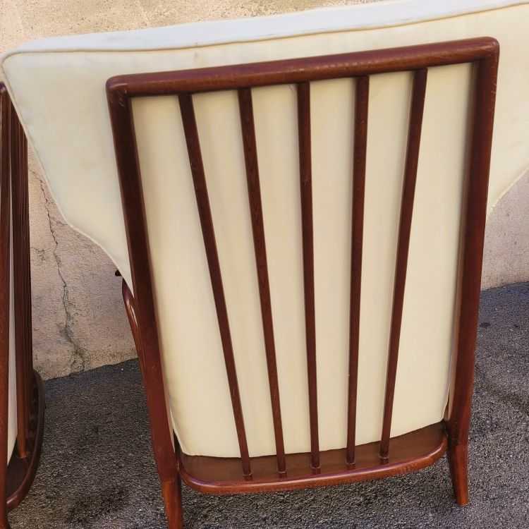 Pair of armchairs in the style of G Scapinelli, late 20th century
