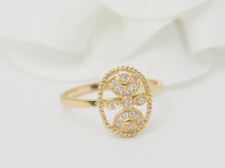 Bague ajourée en or jaune et diamants 