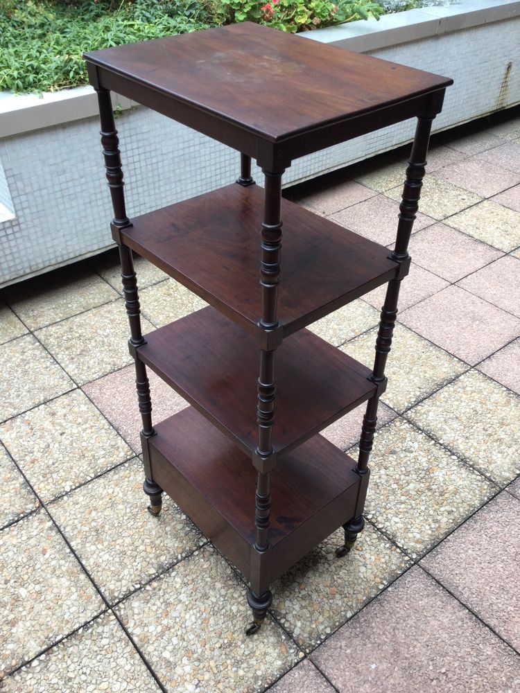 A shelf that can be used as a bookcase or a serving trolley