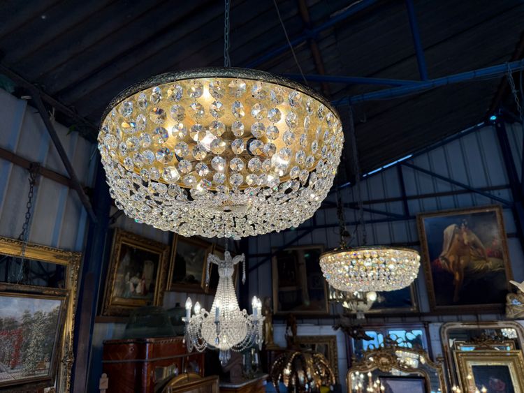 Pair of large Louis XVI style ceiling lights, crystal and brass pendants