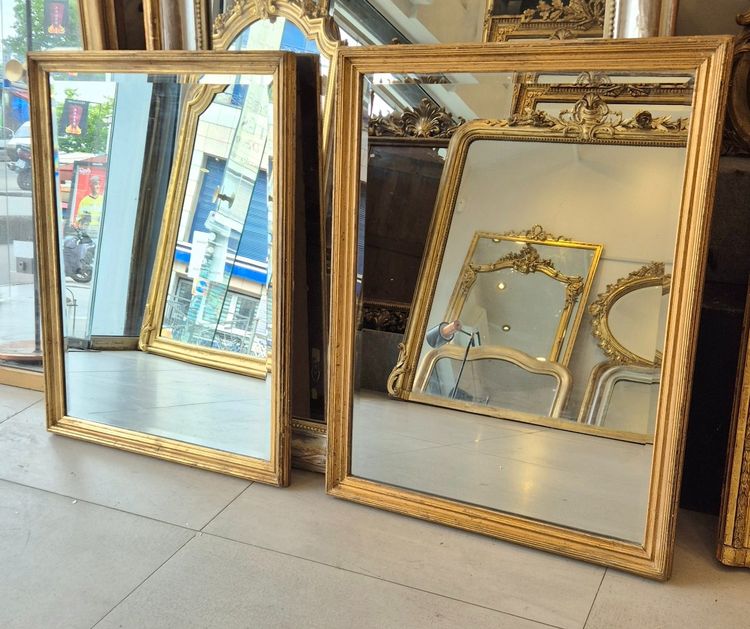 Paire de miroirs style Directoire dorés