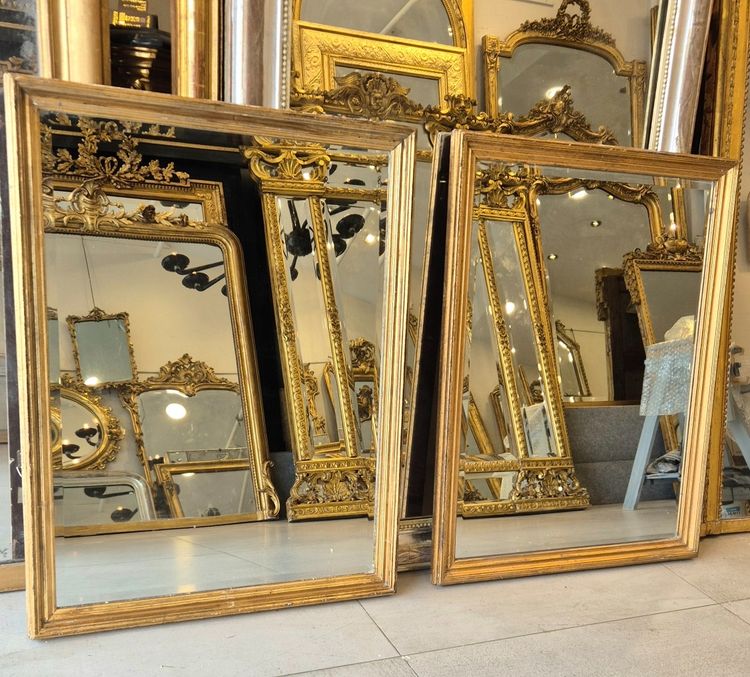 Paire de miroirs style Directoire dorés