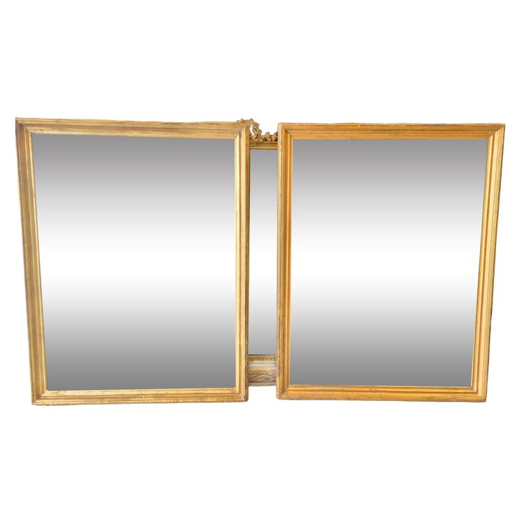 Paire de miroirs style Directoire dorés