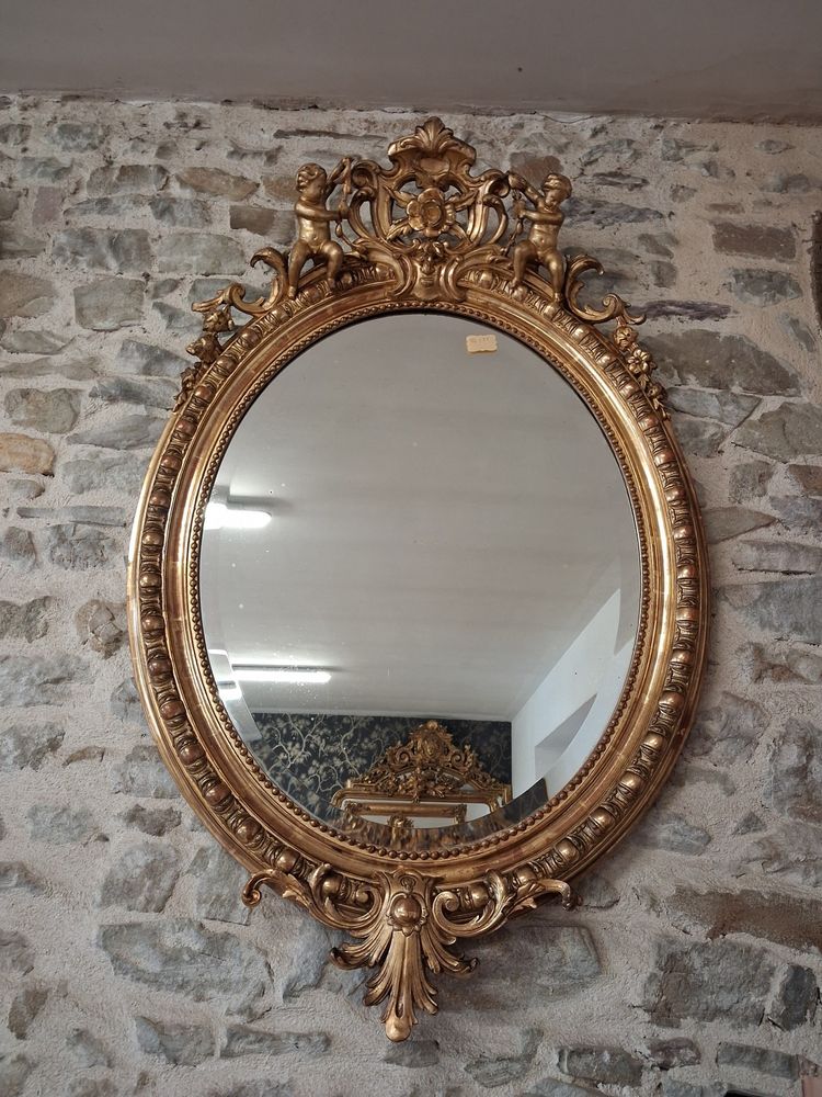 Specchiera ovale con putti XIX secolo 124 x 81