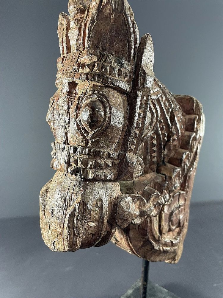 India, 19th century, Votive sculpture in the form of a harnessed horse's head.